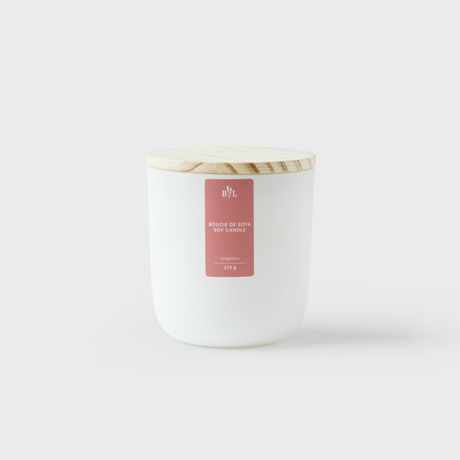 Grande bougie de soya lavande et magnolia dans un contenant en verre blanc mat et couvercle de bois